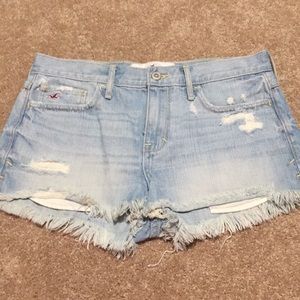 Mid rise distressed jean shorts